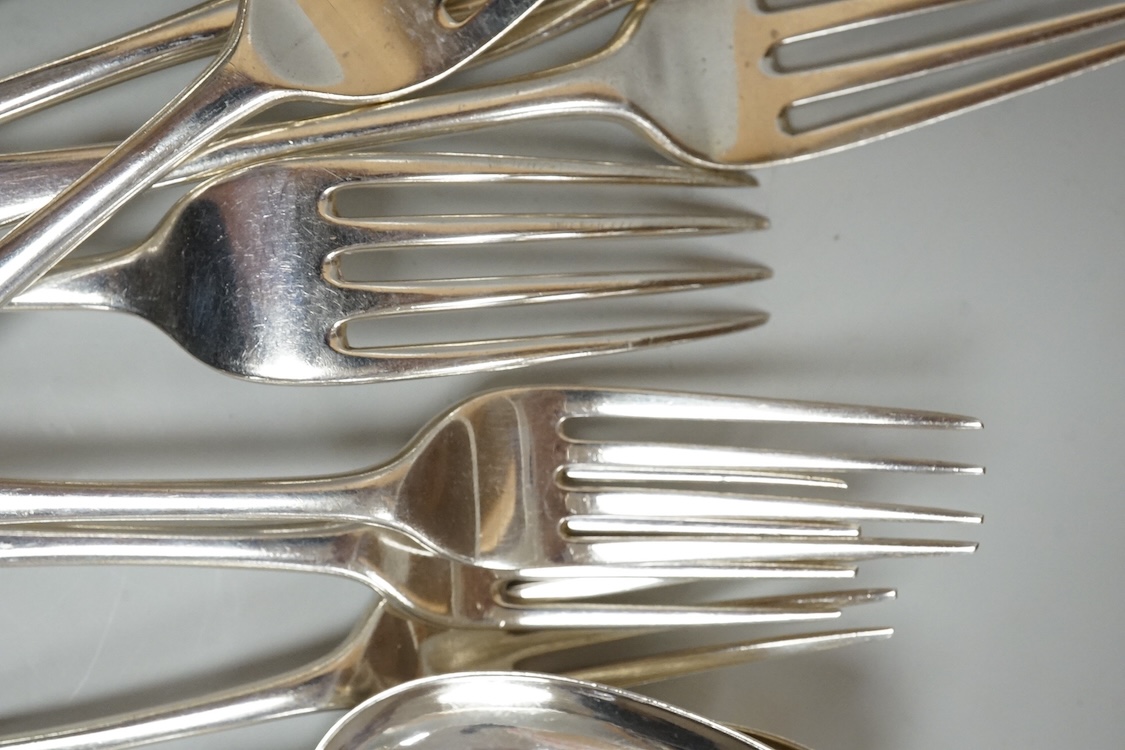 A harlequin part canteen of 19th century Old English pattern flatware, comprising thirty items, all with engraved crest, various dates and makers, 38.1oz.